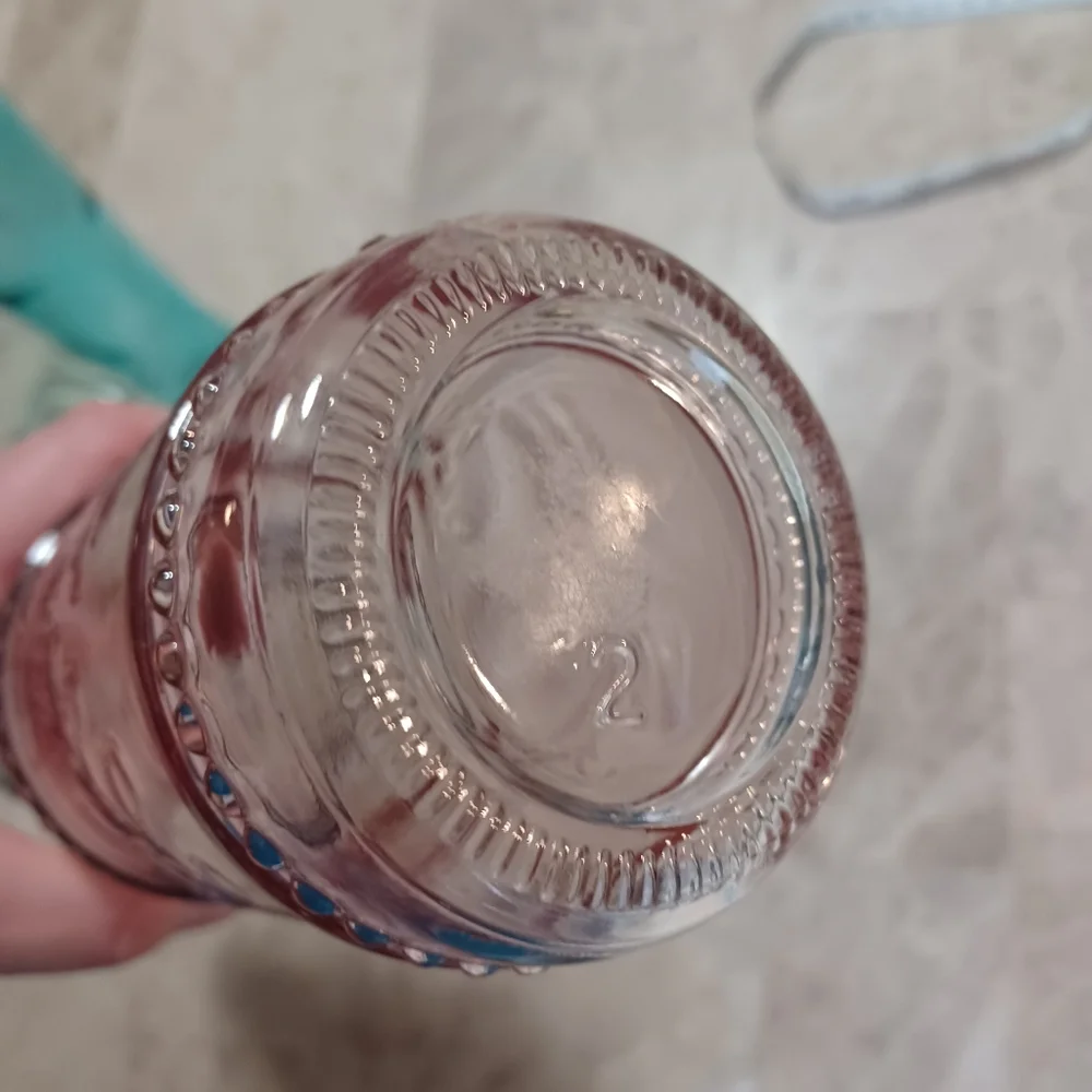 Set of Three Decorative Glass Bottles Clear Glass Light Pink And Teal Vases